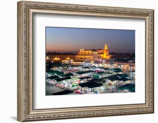Dusk lights over the iconic markets in Jemaa el Fna square, Marrakech, Morocco, North Africa-Roberto Moiola-Framed Photographic Print