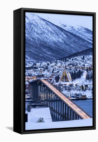 Dusk over the illuminated Bruvegen Bridge and Arctic Cathedral in winter, Tromso-Roberto Moiola-Framed Premier Image Canvas