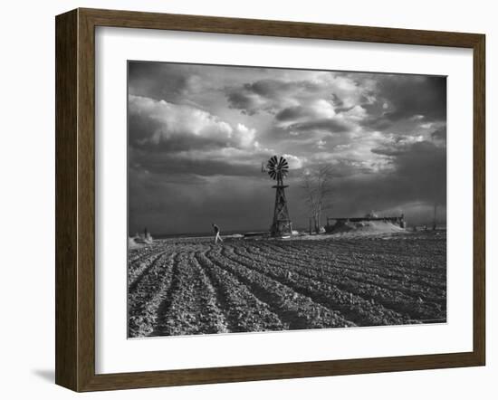 Dust Storm Rising over Farmer Walking Across His Plowed Field-Margaret Bourke-White-Framed Photographic Print