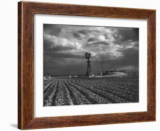 Dust Storm Rising over Farmer Walking Across His Plowed Field-Margaret Bourke-White-Framed Photographic Print