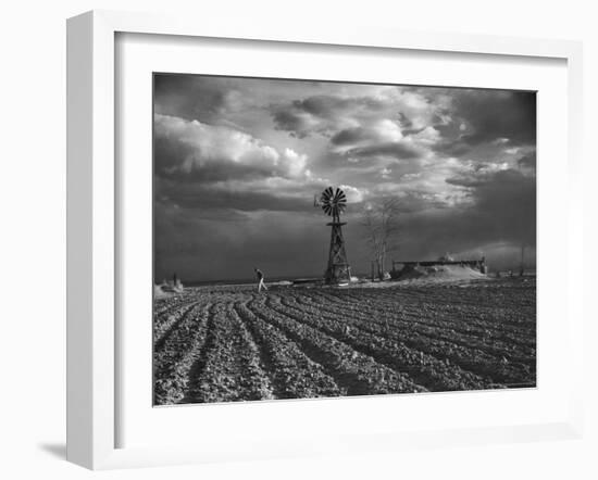 Dust Storm Rising over Farmer Walking Across His Plowed Field-Margaret Bourke-White-Framed Photographic Print