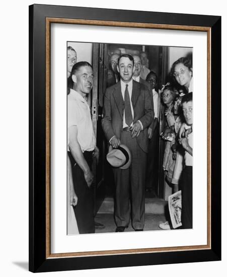 Dutch Schultz, Emerging from Doorway of Malone County Jail, in an Upstate New York Town, 1936-null-Framed Photo