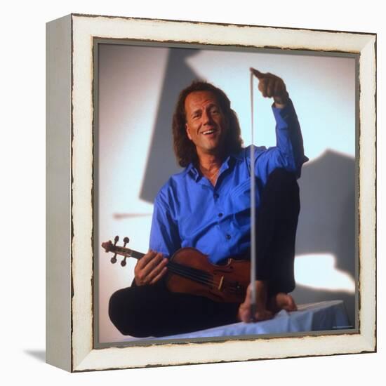 Dutch Violinist Andre Rieu Relaxing, Taking Practice Break with Violin-Ted Thai-Framed Premier Image Canvas