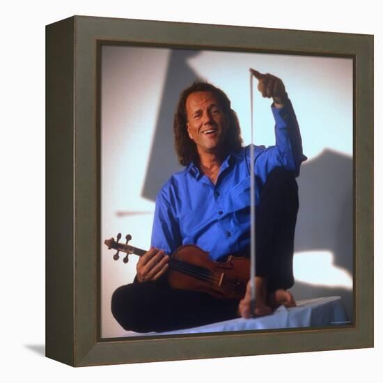 Dutch Violinist Andre Rieu Relaxing, Taking Practice Break with Violin-Ted Thai-Framed Premier Image Canvas