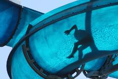 Kid Sliding a Blue Waterslide-DWaschnig-Framed Photographic Print