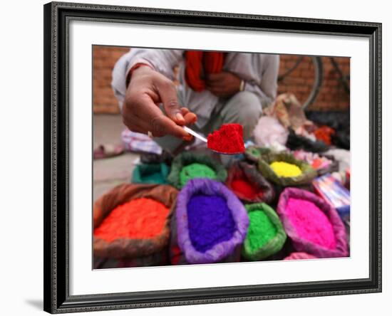 Dye Trader Offers His Brightly Coloured Wares in a Roadside Stall in Kathmandu, Nepal, Asia-David Pickford-Framed Photographic Print