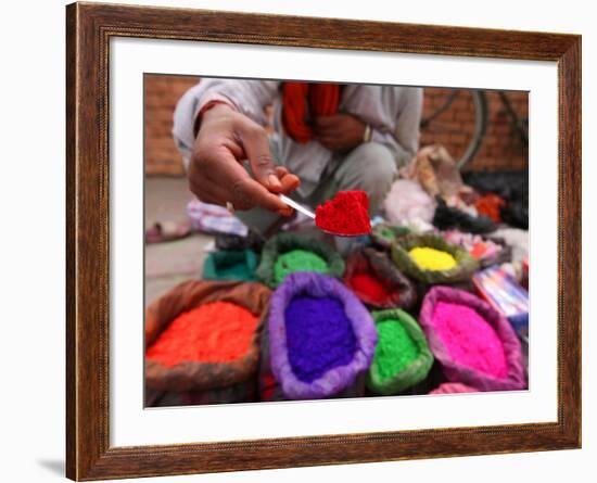 Dye Trader Offers His Brightly Coloured Wares in a Roadside Stall in Kathmandu, Nepal, Asia-David Pickford-Framed Photographic Print