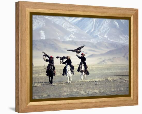 Eagle Hunters Dalai Khan, Takhuu Grandfather, Son Kook Kook, Golden Eagle Festival, Mongolia-Amos Nachoum-Framed Premier Image Canvas