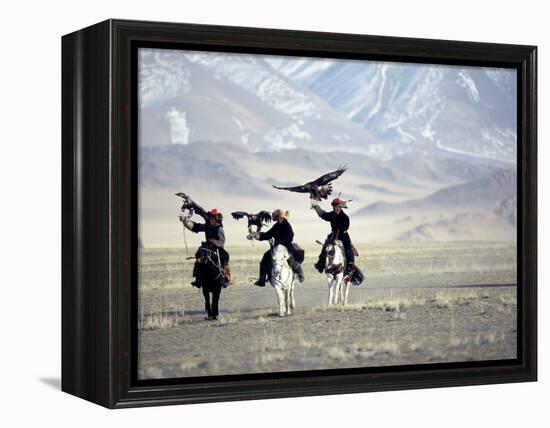 Eagle Hunters Dalai Khan, Takhuu Grandfather, Son Kook Kook, Golden Eagle Festival, Mongolia-Amos Nachoum-Framed Premier Image Canvas