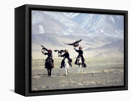 Eagle Hunters Dalai Khan, Takhuu Grandfather, Son Kook Kook, Golden Eagle Festival, Mongolia-Amos Nachoum-Framed Premier Image Canvas