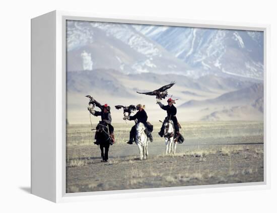 Eagle Hunters Dalai Khan, Takhuu Grandfather, Son Kook Kook, Golden Eagle Festival, Mongolia-Amos Nachoum-Framed Premier Image Canvas