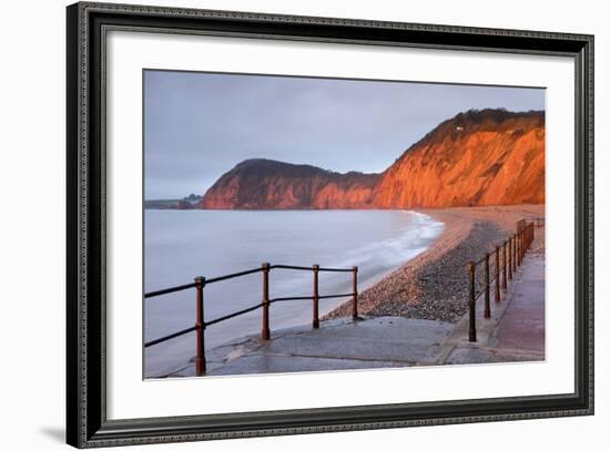 Early Morning Sunlight Glows Against the Distinctive Red Cliffs of High Peak, Sidmouth, Devon-Adam Burton-Framed Photographic Print