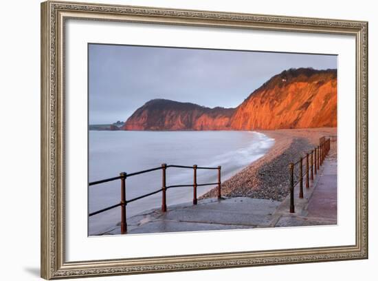 Early Morning Sunlight Glows Against the Distinctive Red Cliffs of High Peak, Sidmouth, Devon-Adam Burton-Framed Photographic Print