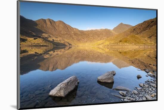 Early morning sunlight on Snowdon in spring, reflected in Llyn Llydaw, Snowdonia National Park-Adam Burton-Mounted Photographic Print