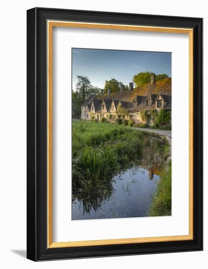 Early Spring morning view of the beautiful Cotswolds cottages at Arlington Row in Bibury-Adam Burton-Framed Photographic Print