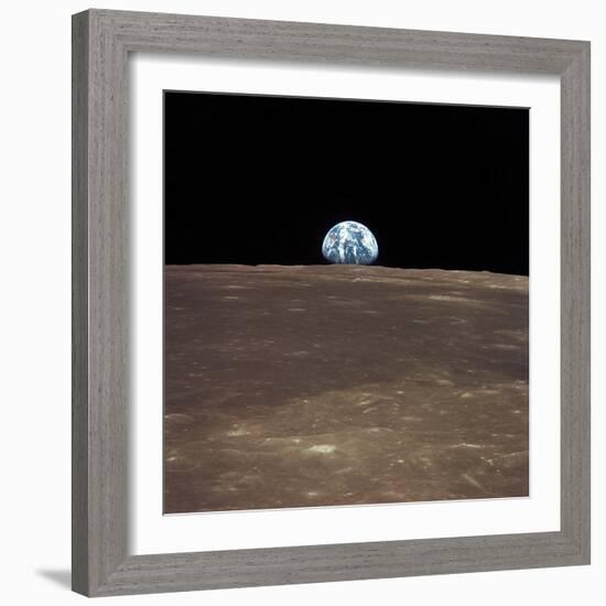 Earth Rising Above the Moon's Horizon-Stocktrek Images-Framed Photographic Print