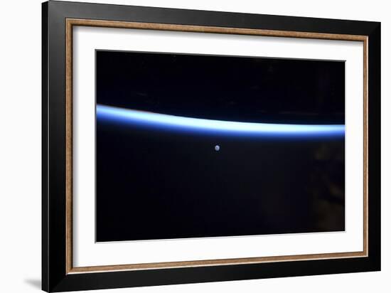 Earth's Thin Line of Atmosphere and a Gibbous Moon-null-Framed Photographic Print