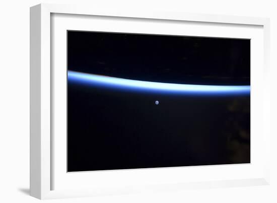 Earth's Thin Line of Atmosphere and a Gibbous Moon-null-Framed Photographic Print