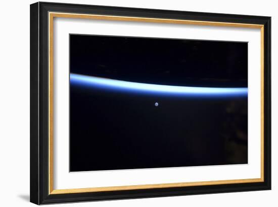 Earth's Thin Line of Atmosphere and a Gibbous Moon-null-Framed Photographic Print