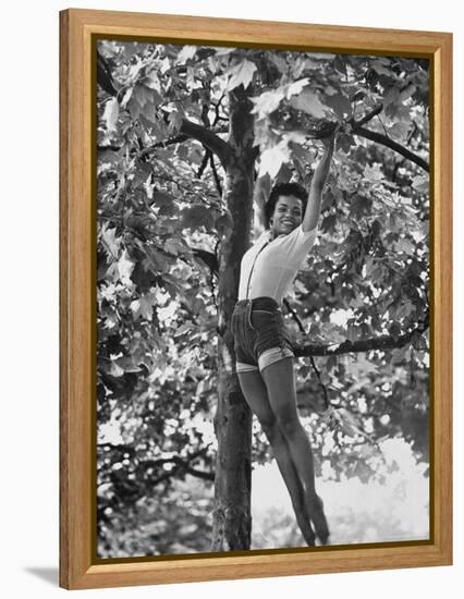 Eartha Kitt Playing in the Tree-Gordon Parks-Framed Premier Image Canvas