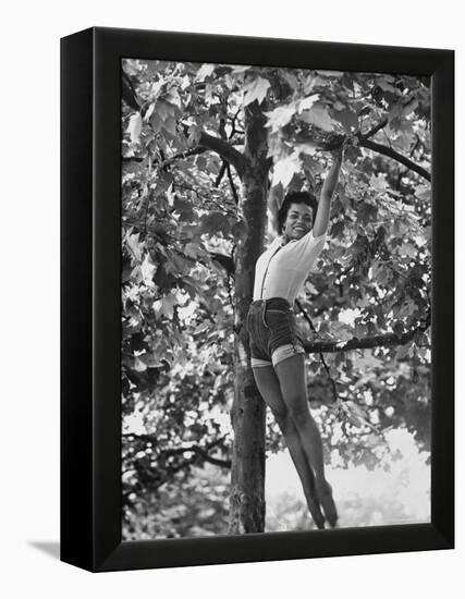 Eartha Kitt Playing in the Tree-Gordon Parks-Framed Premier Image Canvas