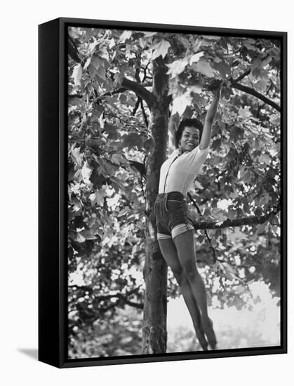 Eartha Kitt Playing in the Tree-Gordon Parks-Framed Premier Image Canvas