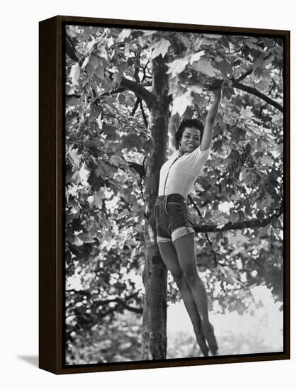 Eartha Kitt Playing in the Tree-Gordon Parks-Framed Premier Image Canvas