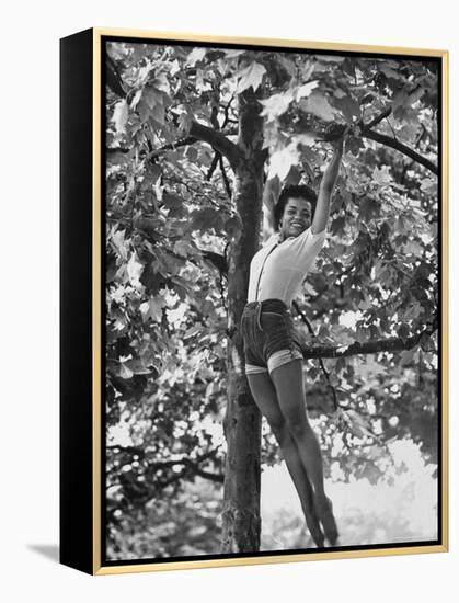 Eartha Kitt Playing in the Tree-Gordon Parks-Framed Premier Image Canvas