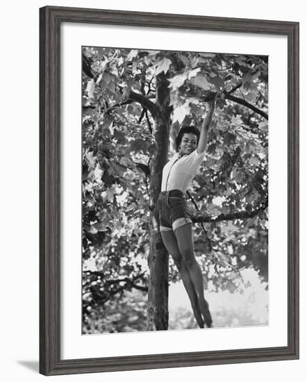 Eartha Kitt Playing in the Tree-Gordon Parks-Framed Premium Photographic Print
