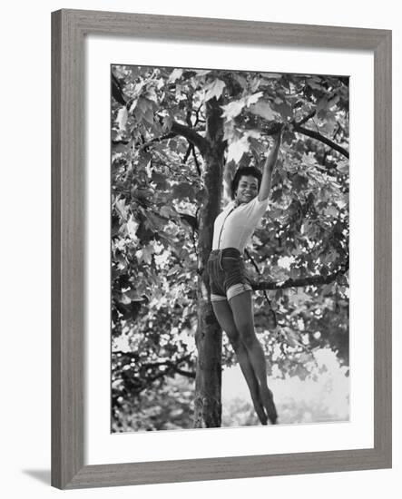 Eartha Kitt Playing in the Tree-Gordon Parks-Framed Premium Photographic Print