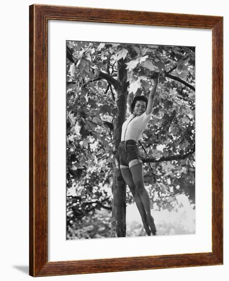 Eartha Kitt Playing in the Tree-Gordon Parks-Framed Premium Photographic Print