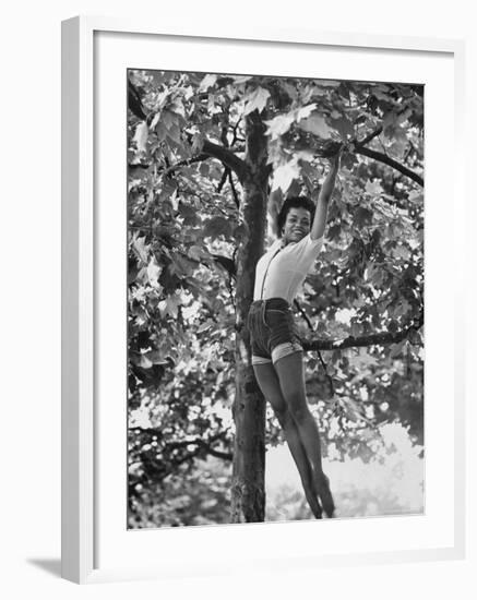 Eartha Kitt Playing in the Tree-Gordon Parks-Framed Premium Photographic Print