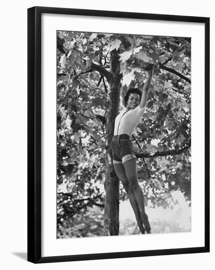 Eartha Kitt Playing in the Tree-Gordon Parks-Framed Premium Photographic Print