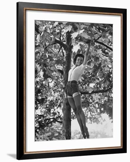 Eartha Kitt Playing in the Tree-Gordon Parks-Framed Premium Photographic Print