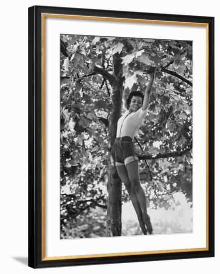 Eartha Kitt Playing in the Tree-Gordon Parks-Framed Premium Photographic Print