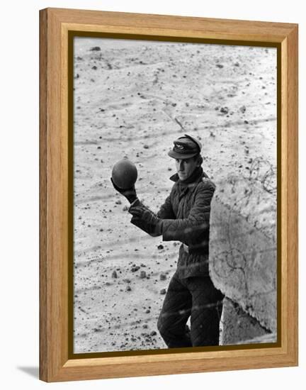 East German Border Guard Tossing Ball over Berlin Wall after German boy accidently threw it over-Paul Schutzer-Framed Premier Image Canvas