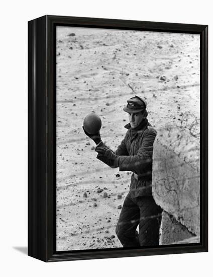 East German Border Guard Tossing Ball over Berlin Wall after German boy accidently threw it over-Paul Schutzer-Framed Premier Image Canvas