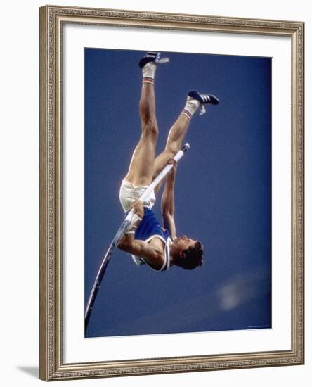 East Germany's Wolfgang Nordwig in Action During Pole Vaulting Event at the Summer Olympics-John Dominis-Framed Premium Photographic Print