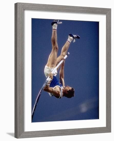 East Germany's Wolfgang Nordwig in Action During Pole Vaulting Event at the Summer Olympics-John Dominis-Framed Premium Photographic Print