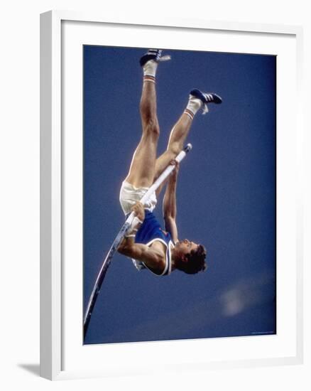 East Germany's Wolfgang Nordwig in Action During Pole Vaulting Event at the Summer Olympics-John Dominis-Framed Premium Photographic Print