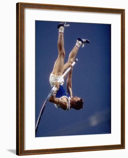 East Germany's Wolfgang Nordwig in Action During Pole Vaulting Event at the Summer Olympics-John Dominis-Framed Premium Photographic Print