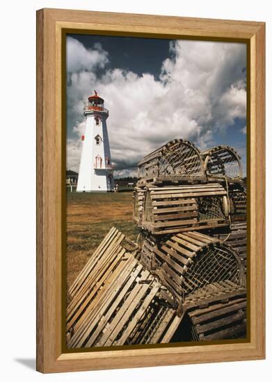 East Point Lighthouse and Lobster Traps, Prince Edward Island, Canada-Walter Bibikow-Framed Premier Image Canvas