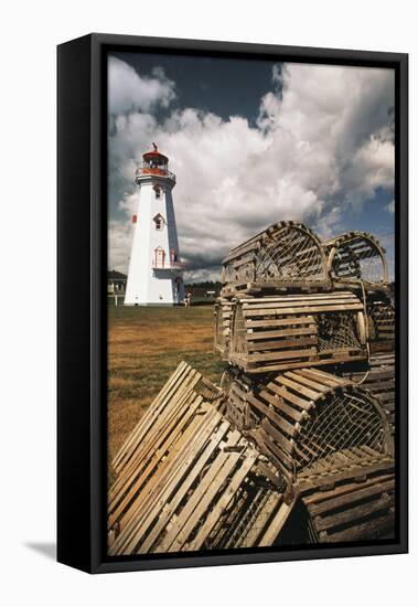 East Point Lighthouse and Lobster Traps, Prince Edward Island, Canada-Walter Bibikow-Framed Premier Image Canvas