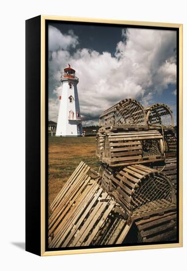 East Point Lighthouse and Lobster Traps, Prince Edward Island, Canada-Walter Bibikow-Framed Premier Image Canvas