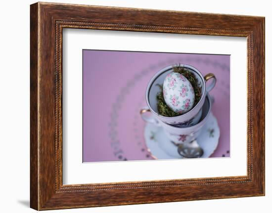 Easter decoration, coffee cups, stacked, Easter egg, bird's-eye view-mauritius images-Framed Photographic Print