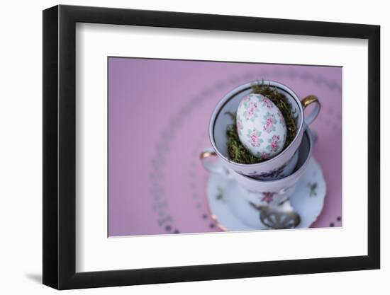 Easter decoration, coffee cups, stacked, Easter egg, bird's-eye view-mauritius images-Framed Photographic Print