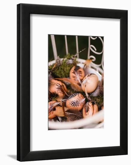 Easter nest with hen's feathers, Still life Easter-mauritius images-Framed Photographic Print