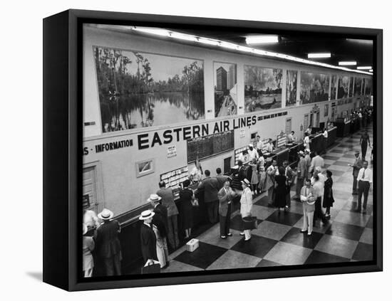 Eastern Airline Customers Checking in their Baggage at the Check-In Counter-Ralph Morse-Framed Premier Image Canvas