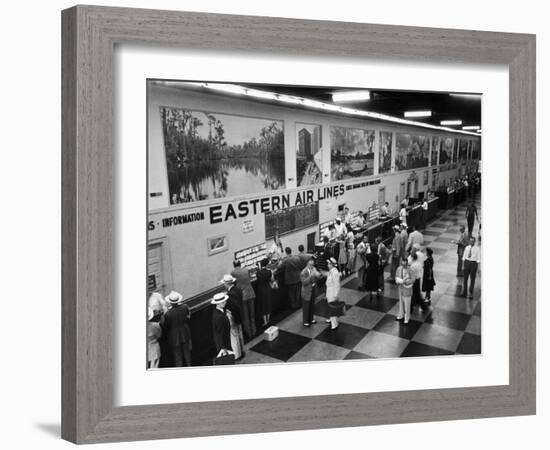 Eastern Airline Customers Checking in their Baggage at the Check-In Counter-Ralph Morse-Framed Photographic Print