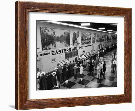 Eastern Airline Customers Checking in their Baggage at the Check-In Counter-Ralph Morse-Framed Photographic Print